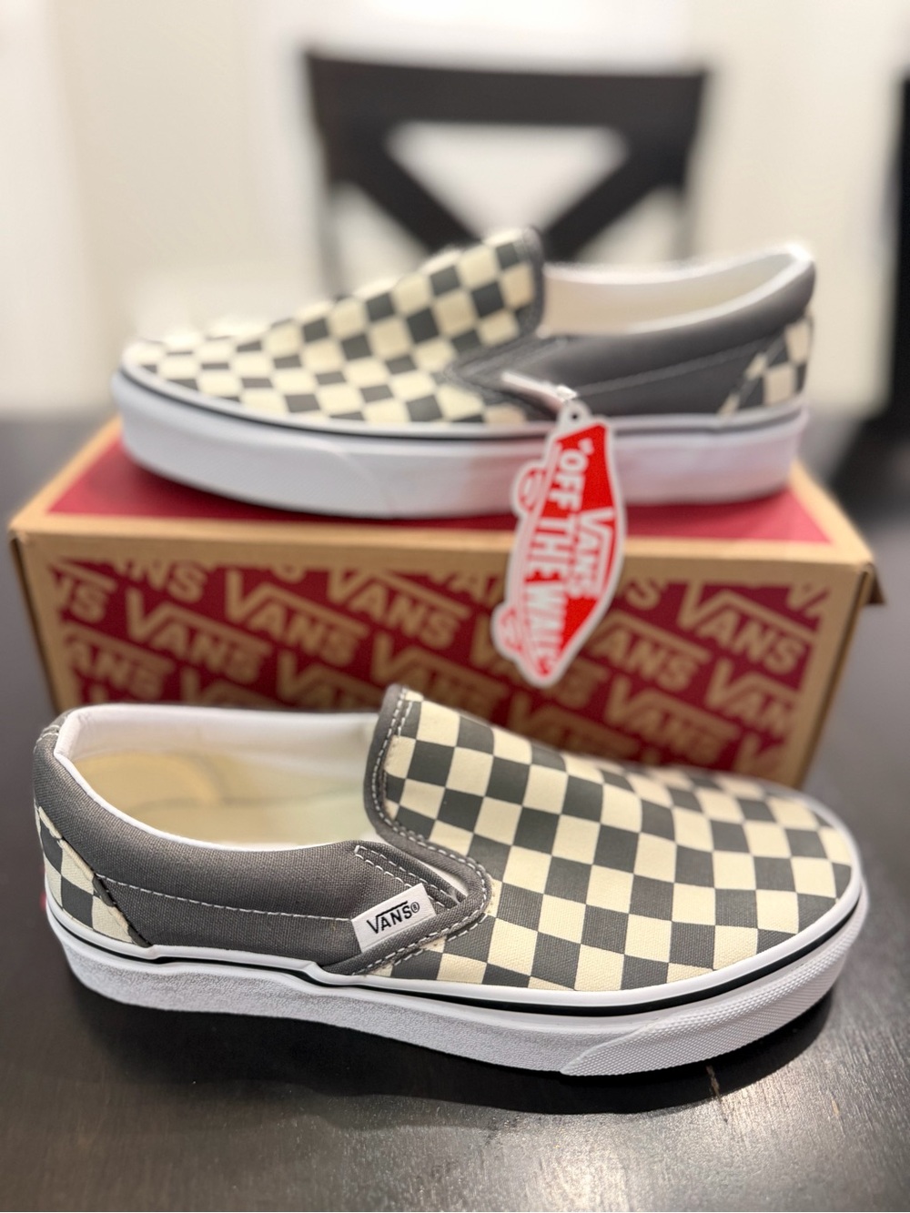 Vans  Slip-On Checkerboard Sneakers in Black and White